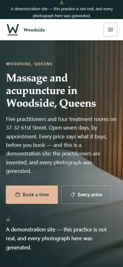 The massage & acupuncture demo website on a phone screen